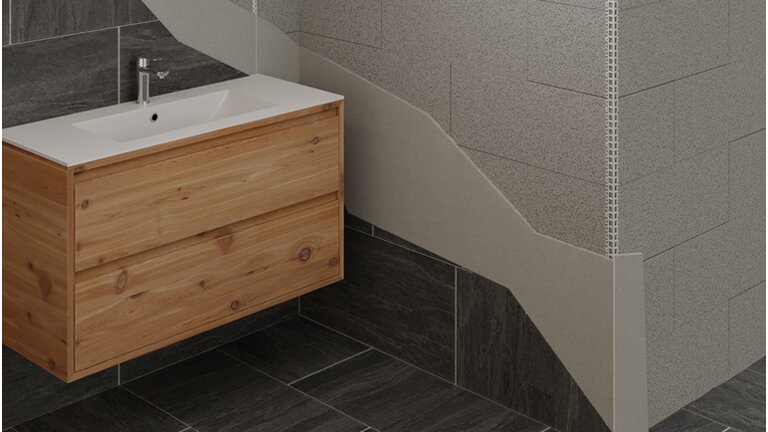 Toilettenbereich mit halbfertiger Wand und Metall Schutzprofile